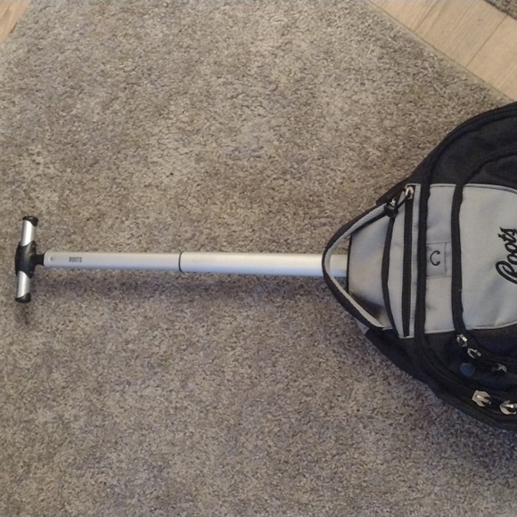 ROOTS WHEELED CARRY ON.  NUMEROUS COMPARTMENTS.  GENTLY USED. - Picture 3 of 9